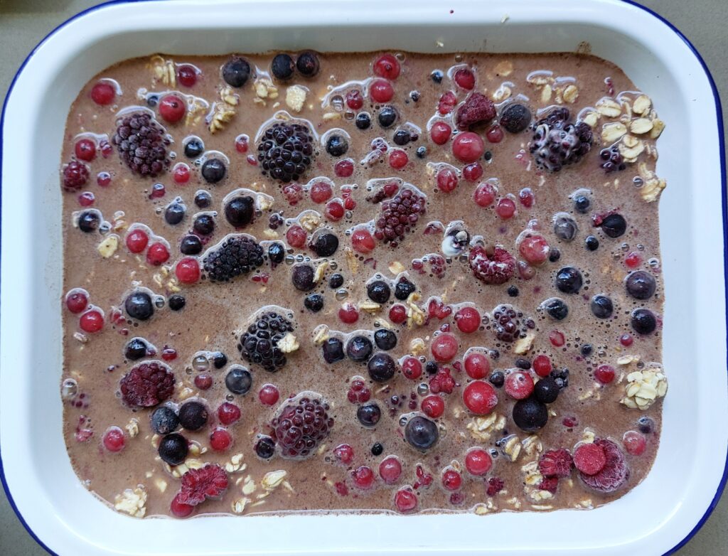 Pour the liquid mixture slowly to evenly distribute.